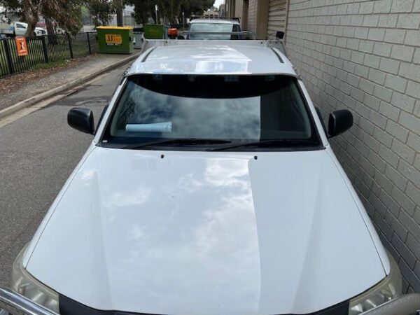 IMG-20250923-WA0042 Toyota Hilux 04/2005-09/2015 Solid Windscreen Sunvisor